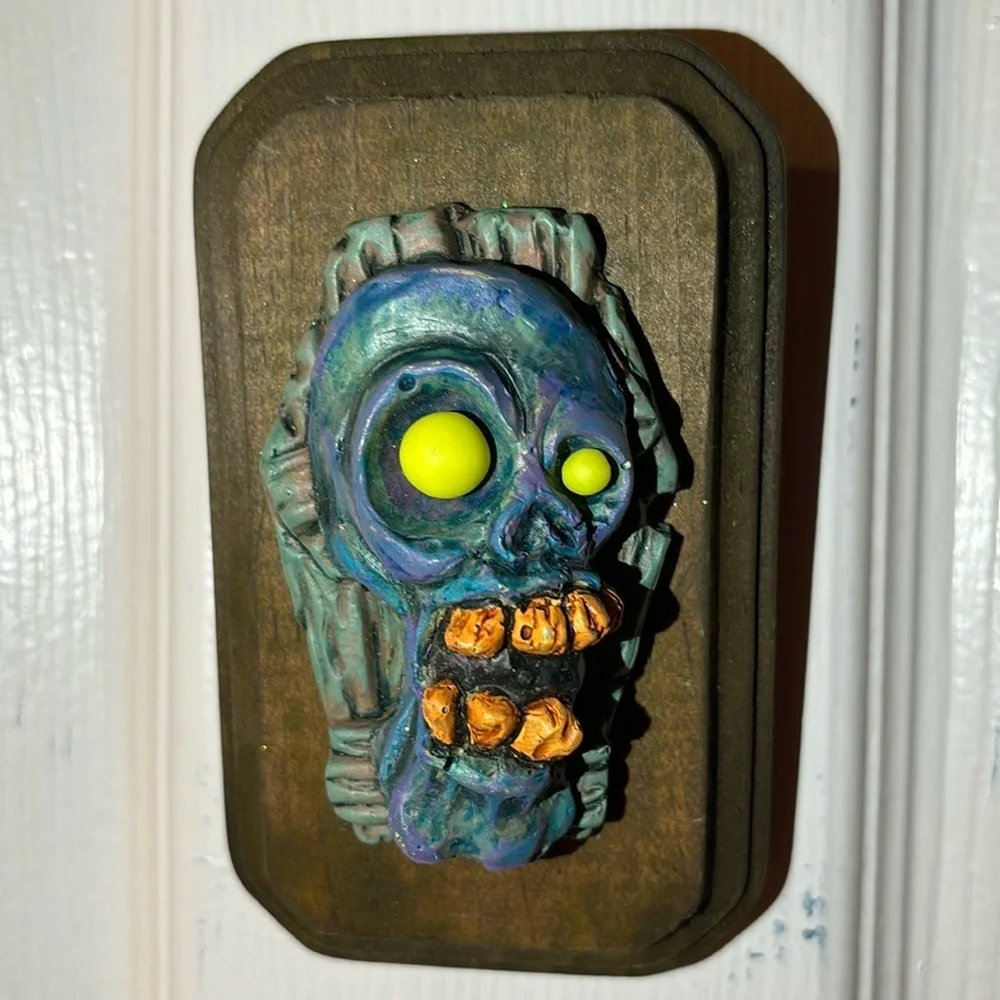 Handmade Coffin Zombie Head wall decor with glow in the dark eyes